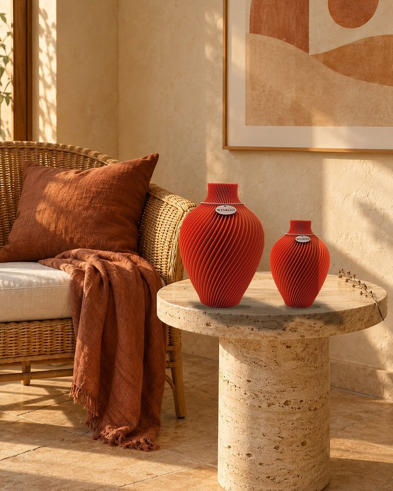 Sunlit Terracotta vases on a stone side table with a rust throw